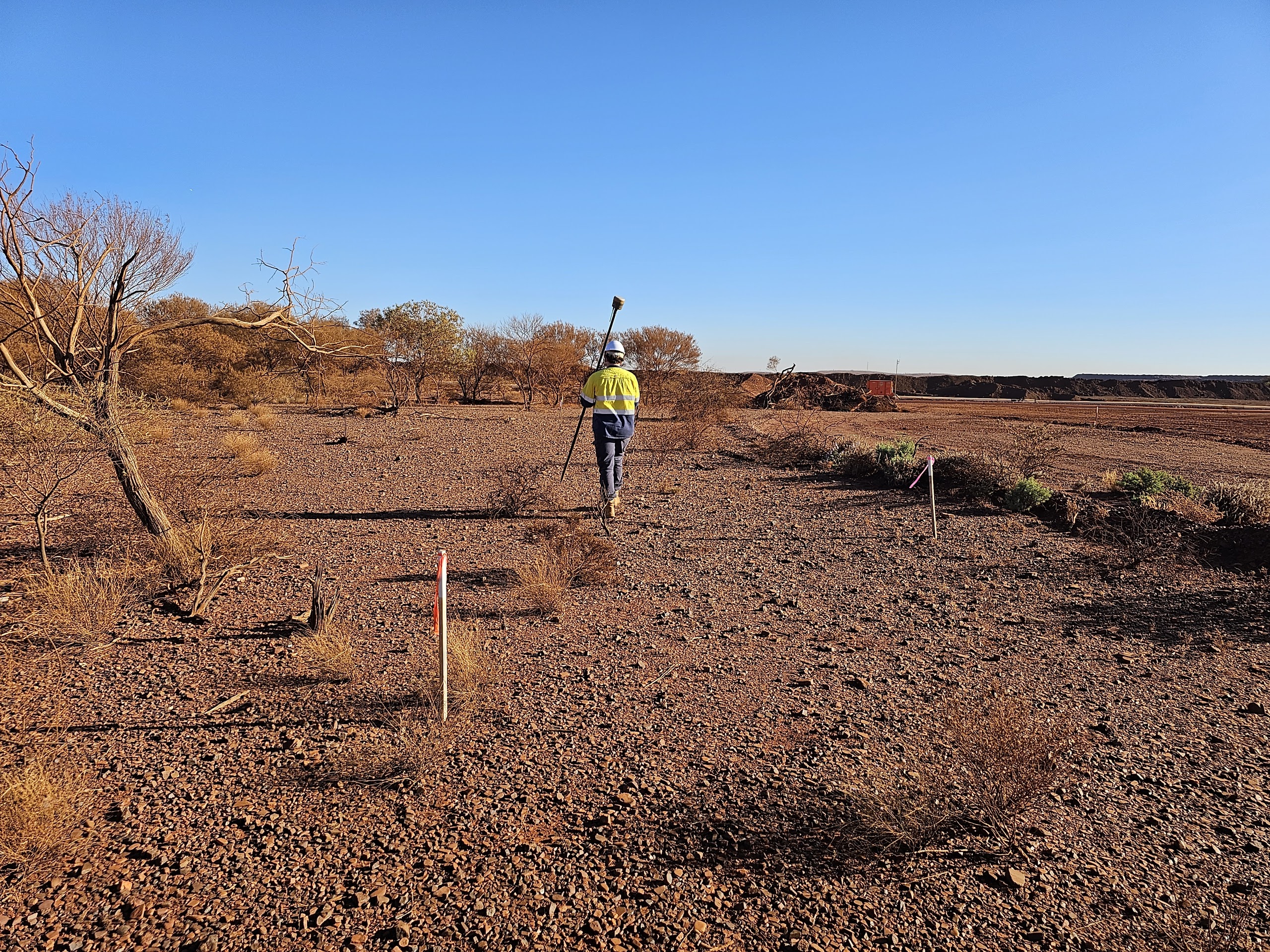 Professional surveyor conducting field operations with state-of-the-art equipment in Western Australia